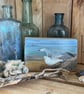 Original acrylic painting of a seagull on reclaimed timber
