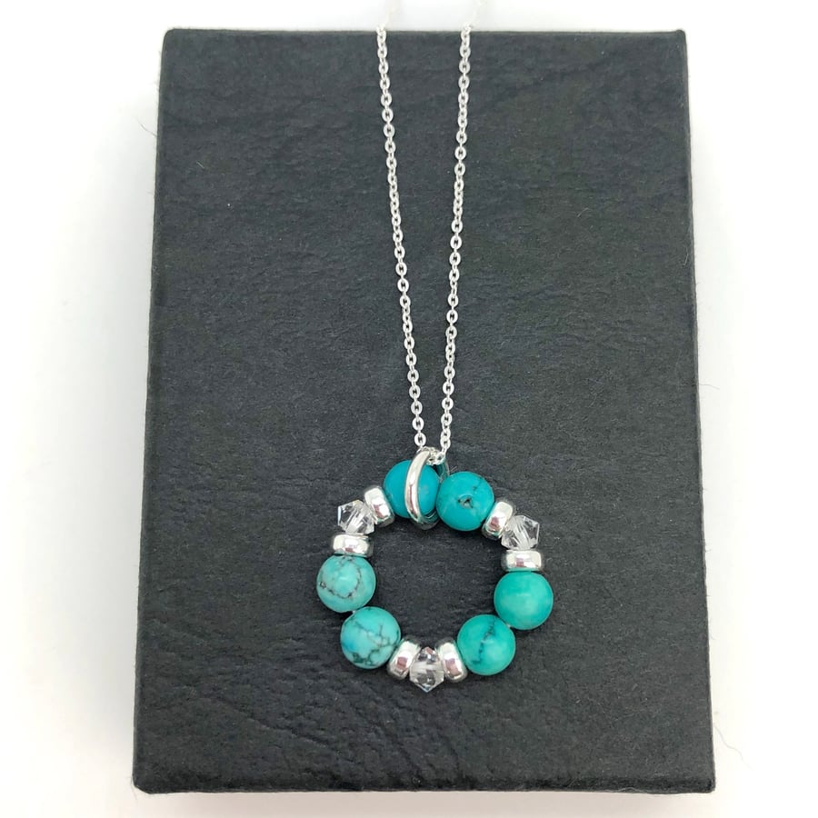 Turquoise and Swarovski Crystal Circle of life pendant. Sterling Silver 