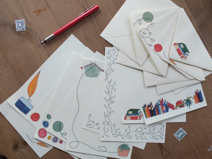 Illustrated letter paper and envelopes with a mix of original designs