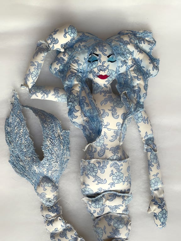 Jointed flowery mermaid art doll 