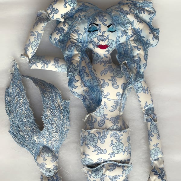 Jointed flowery mermaid art doll 