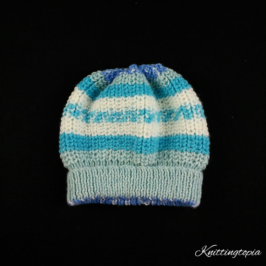 Hand knitted baby Aran ribbed hat in blue and cream mix 17 inch head 6 months 