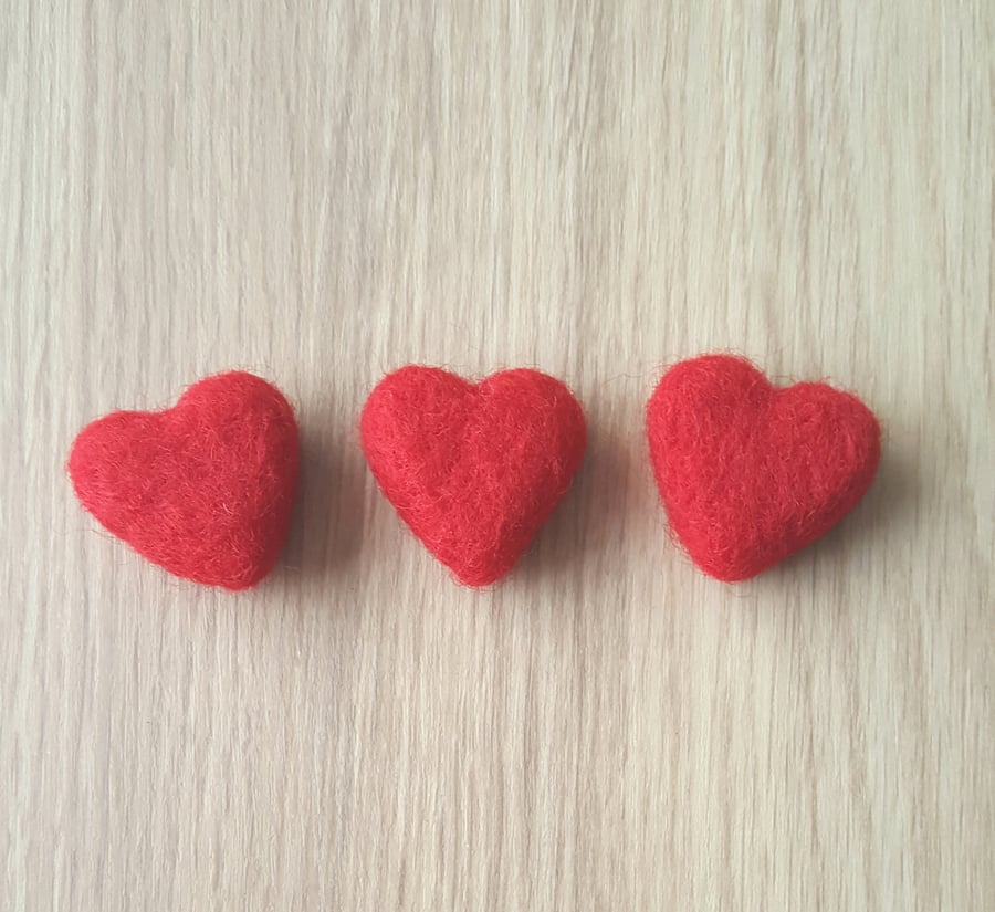 Needle felted heart magnets