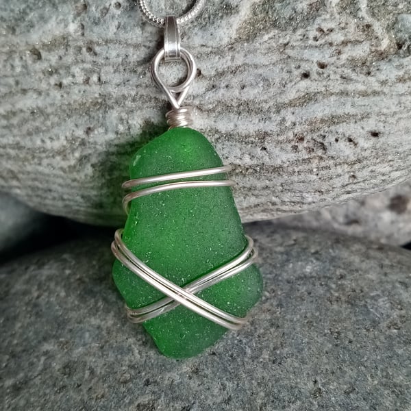 Wire-wrapped Sea glass pendant on a silver plated snake chain 