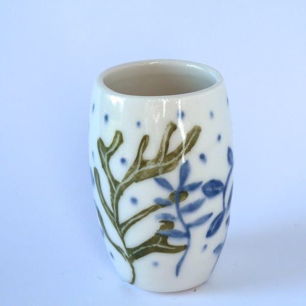 A pretty little porcelain posy vase made by Linda in her pottery in Winchester