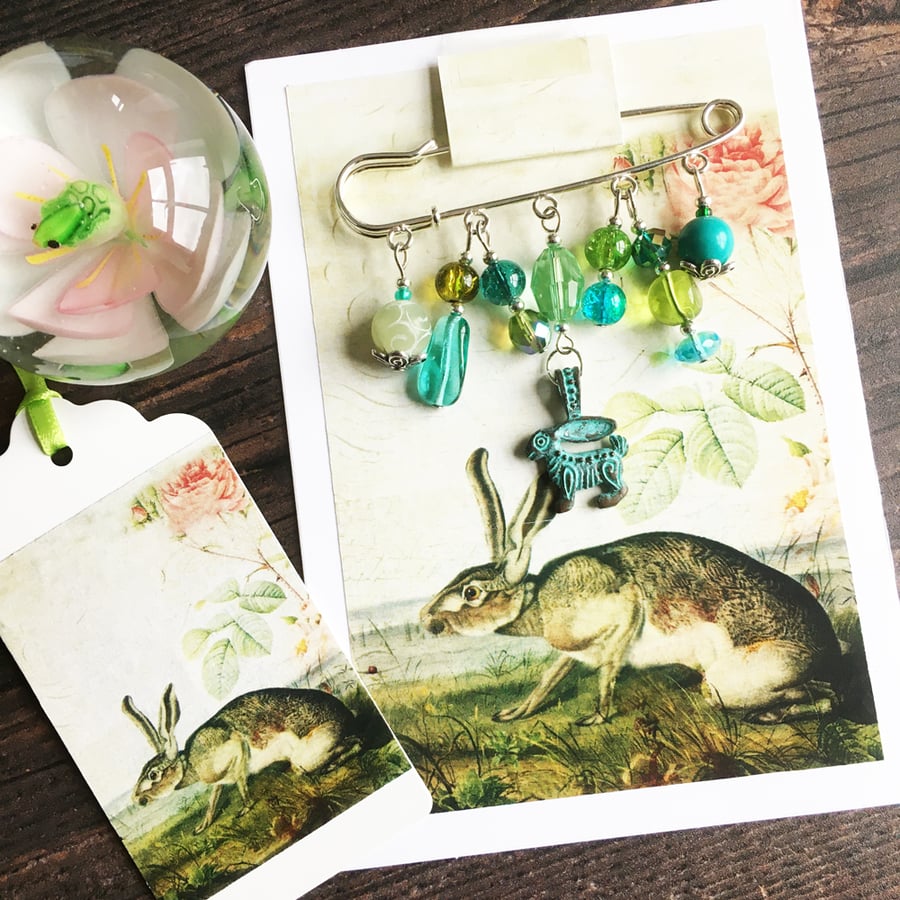 Embellished kilt pin with Mykonos verdigris hare and gift tag