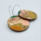 Hooped hand printed wooden dangly earrings in subtle muted colours