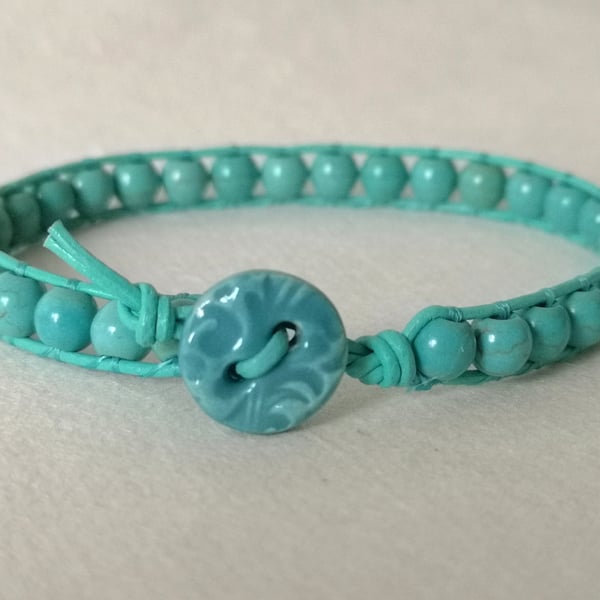 Turquoise bead and leather bracelet with ceramic heart button, December birthday