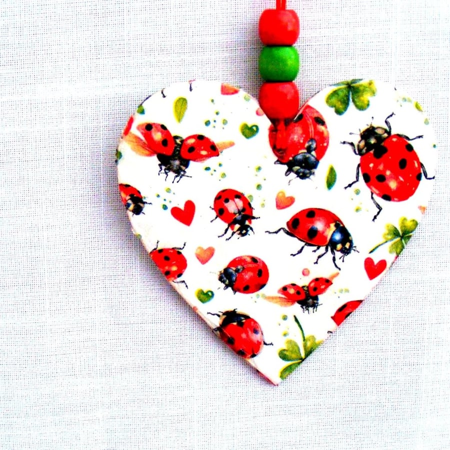 Ladybird decoupaged wooden heart wall hanging