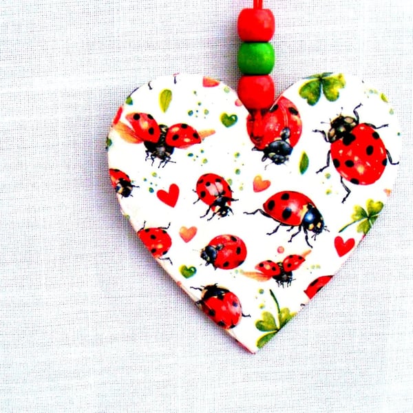 Ladybird decoupaged wooden heart wall hanging