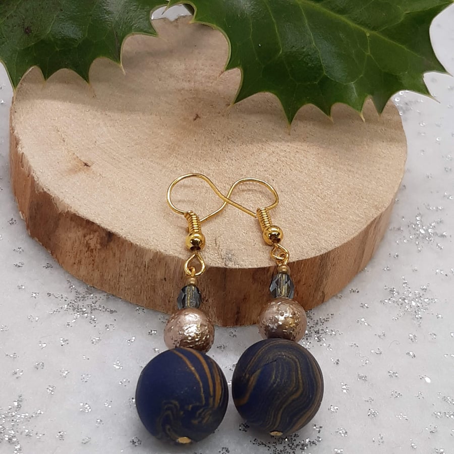 Navy and gold dangly earrings