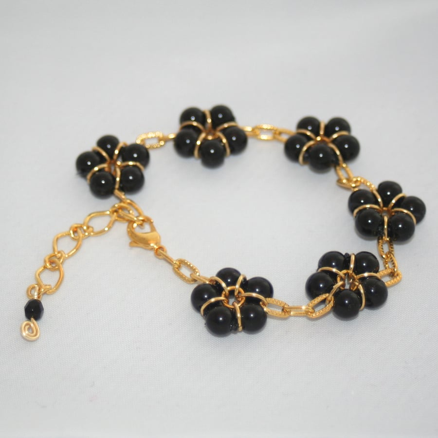 Black and gold flower bracelet