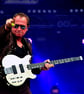 Mark King Level 42 In Concert Photograph Print - Image 1