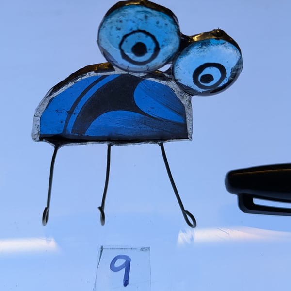 Infestive painted stained glass dome shaped  Bugs with painted eyes and bodies