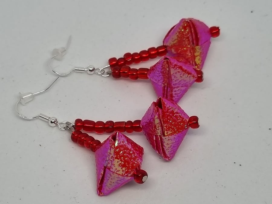Origami earrings:  red, pink iridescent paper and small beads 