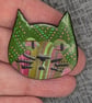 Green dotty stripy cat brooch