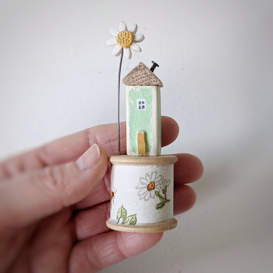 Wooden House on a Vintage Floral Bobbin with Clay Daisy