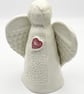 Porcelain Angel sculpture with red heart - Image 2
