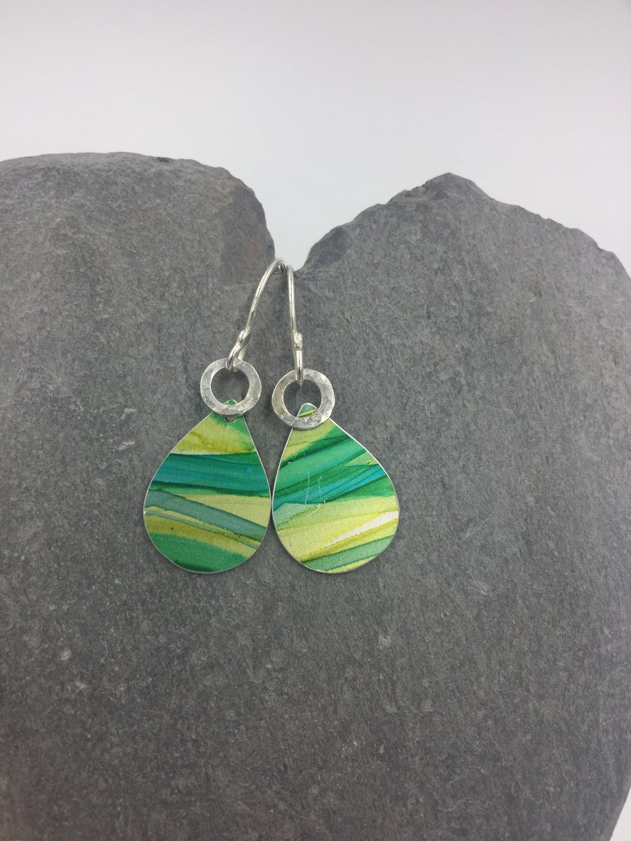Stripy green drop earrings with hammered silver ring.