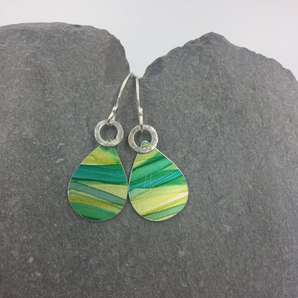 Stripy green drop earrings with hammered silver ring.