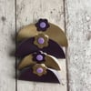  Set of 4 Gold & Purple Faux Leather Cord Tidies with Daisy decoration