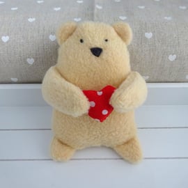 hand stitched bear with red heart