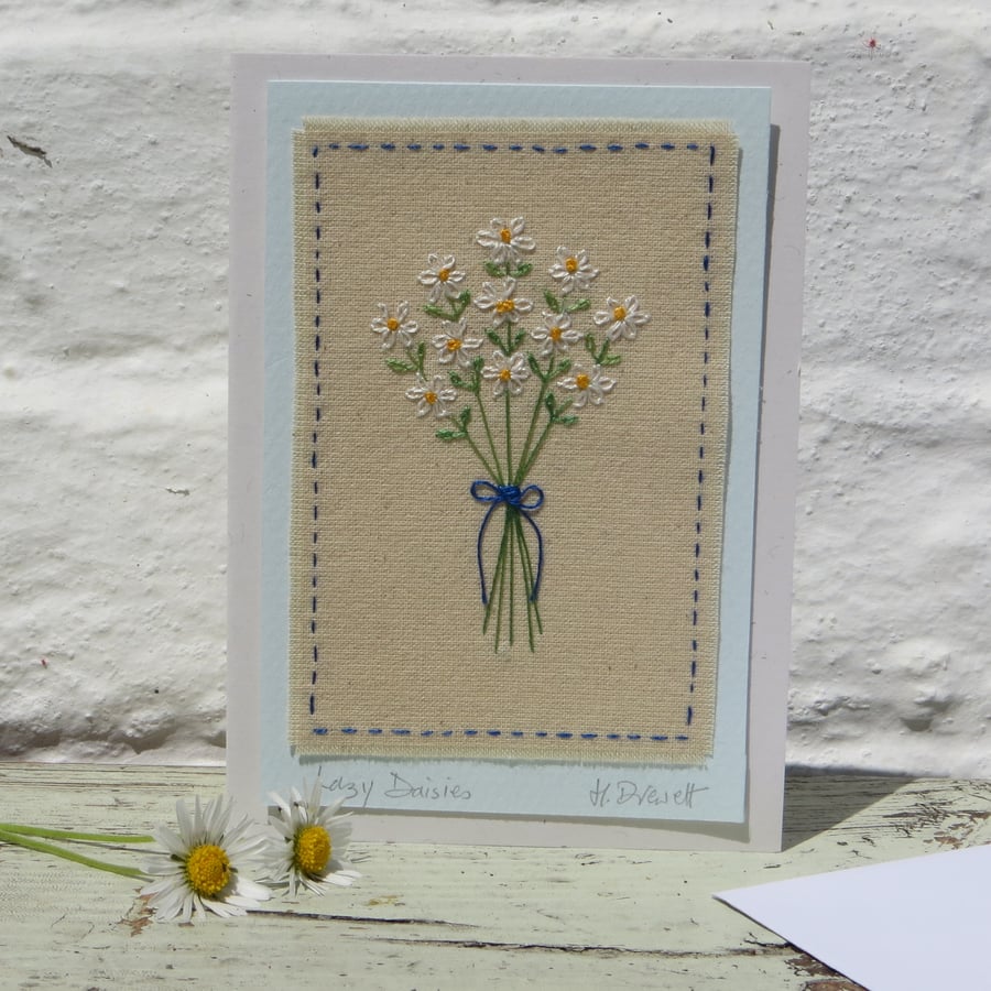 Lazy Daisies hand embroidered card with finely worked daisies and bow