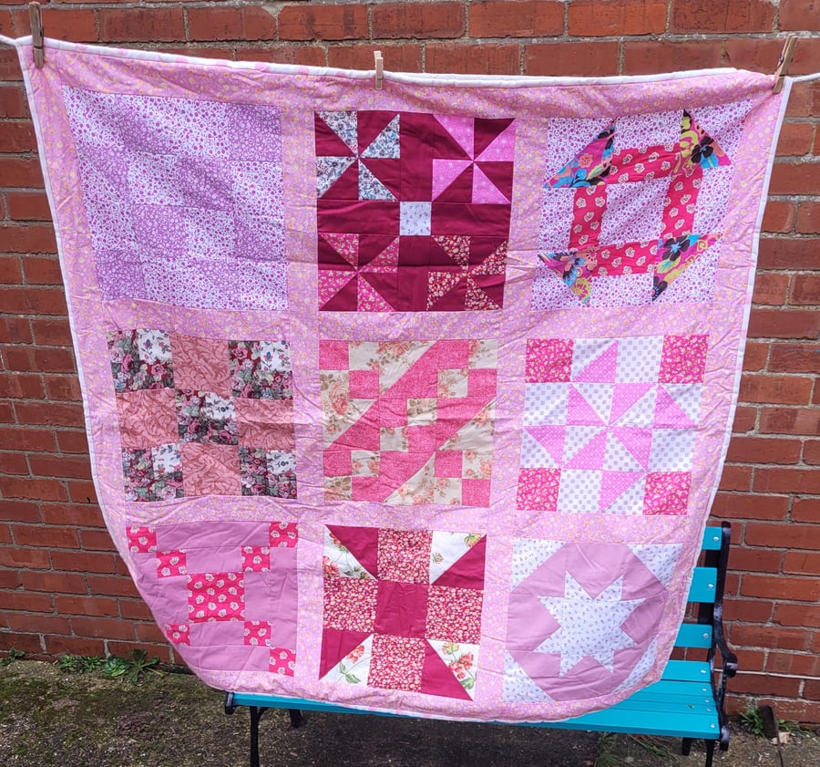 Homemade Pink and red Sampler Patchwork quilt. 44" square