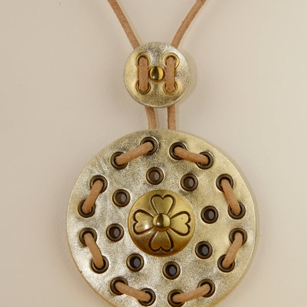 GOLD CIRCULAR LEATHER PENDANT