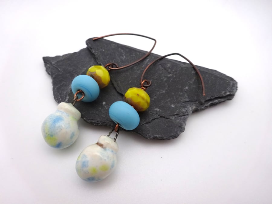 blue and yellow lampwork glass and ceramic earrings
