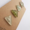Set of four pale green sea glass buttons
