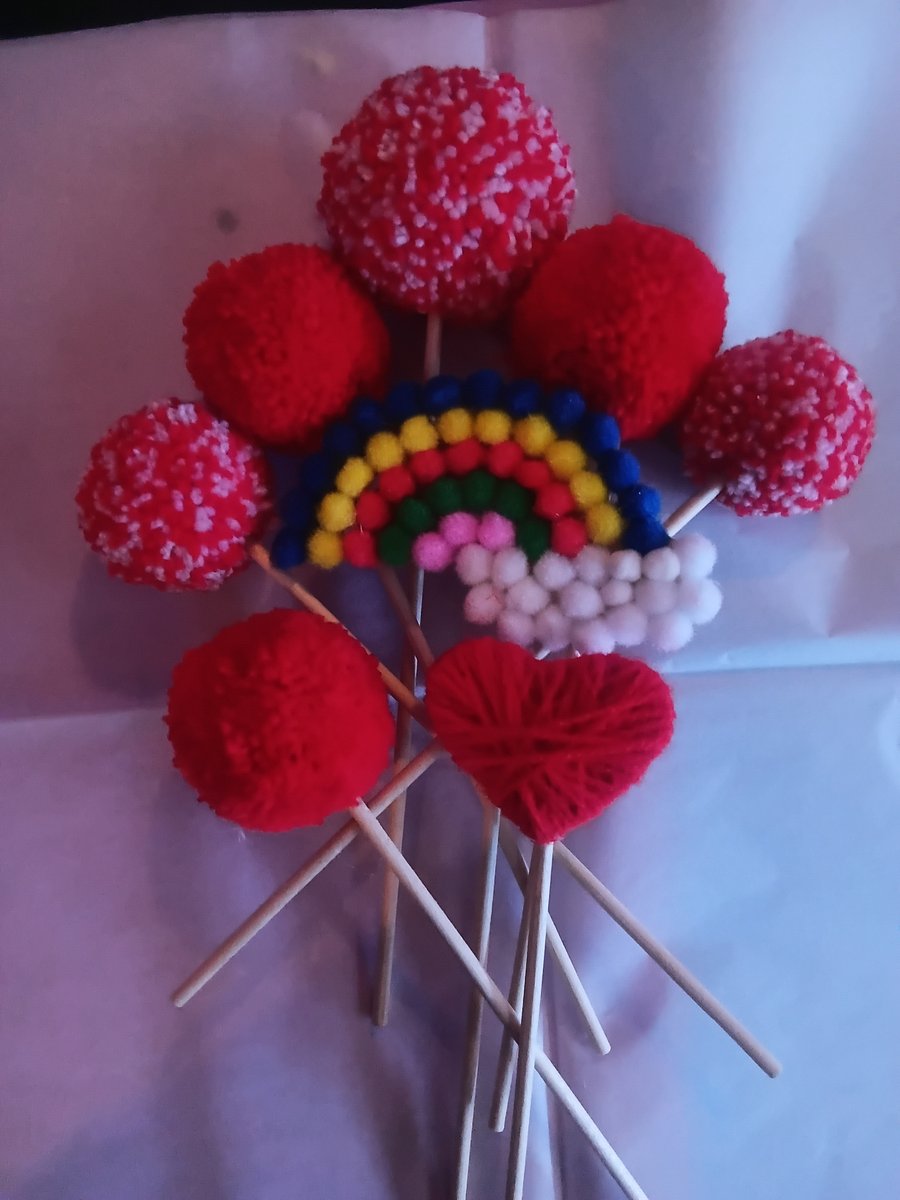 Pom pom bouquet 1x large 5x medium, heart, rainbow. Will be wrapped in tissue