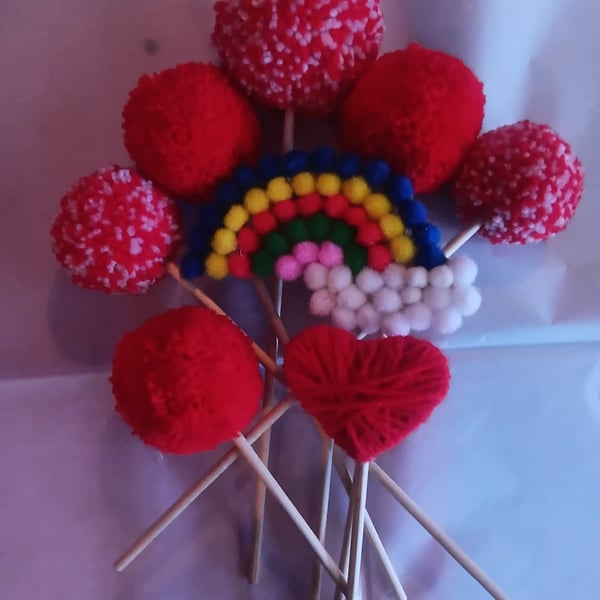 Pom pom bouquet 1x large 5x medium, heart, rainbow. Will be wrapped in tissue