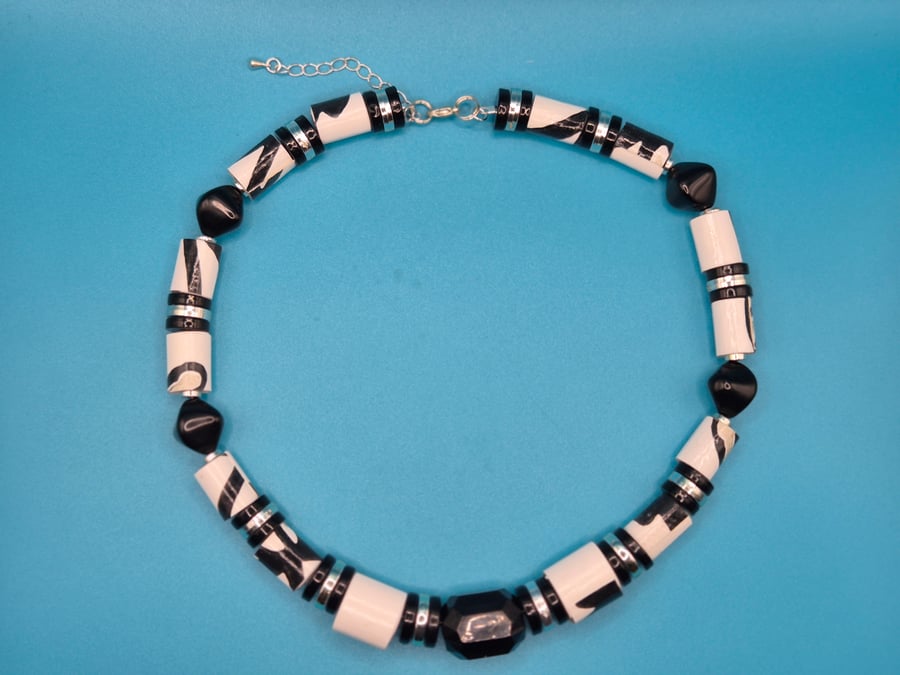 Black and white striking necklace made with recycled paper