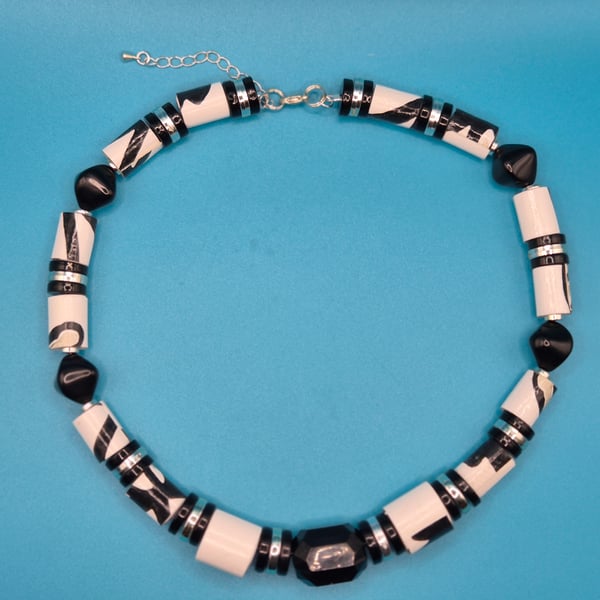 Black and white striking necklace made with recycled paper