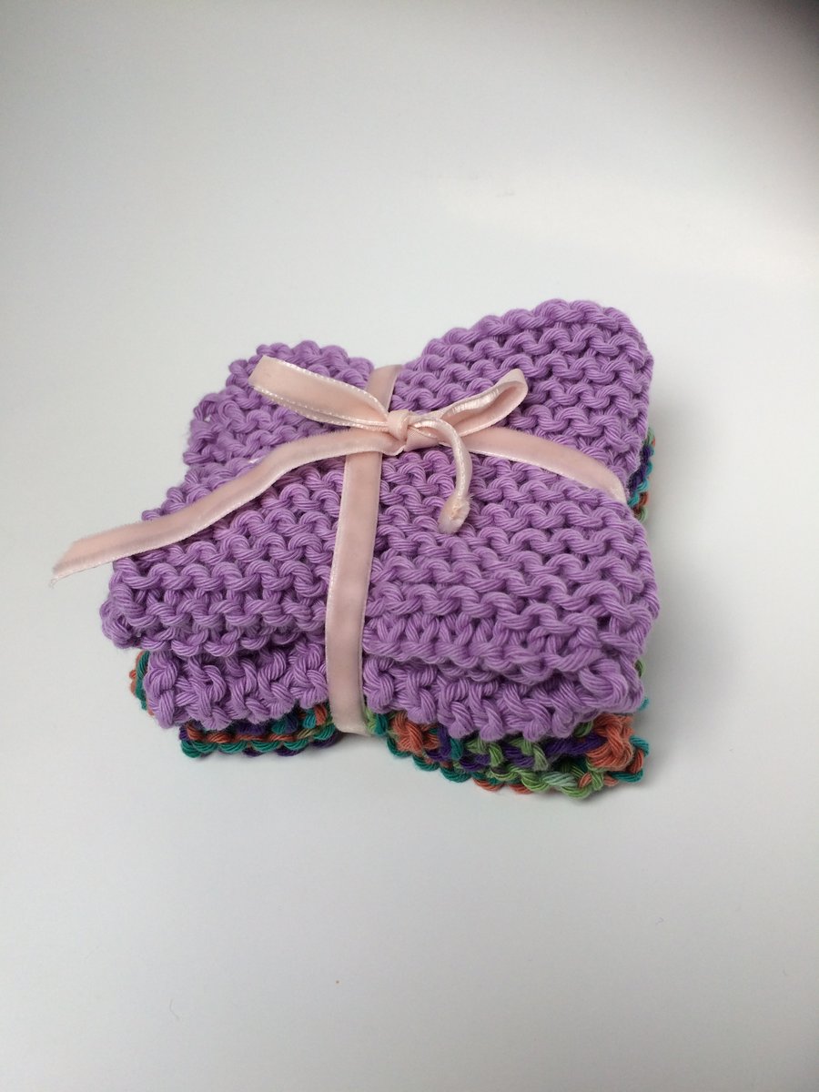 Pack of two soft, hand knitted, cotton wash cloths for gentle skincare.