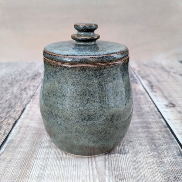 Ceramic lidded pot with brown blue glaze