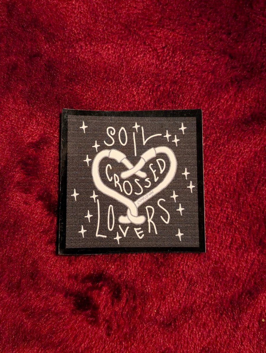 soil crossed lovers sticker
