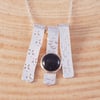 Sterling Silver Textured Strips Necklace with Blue Goldstone Cabochon