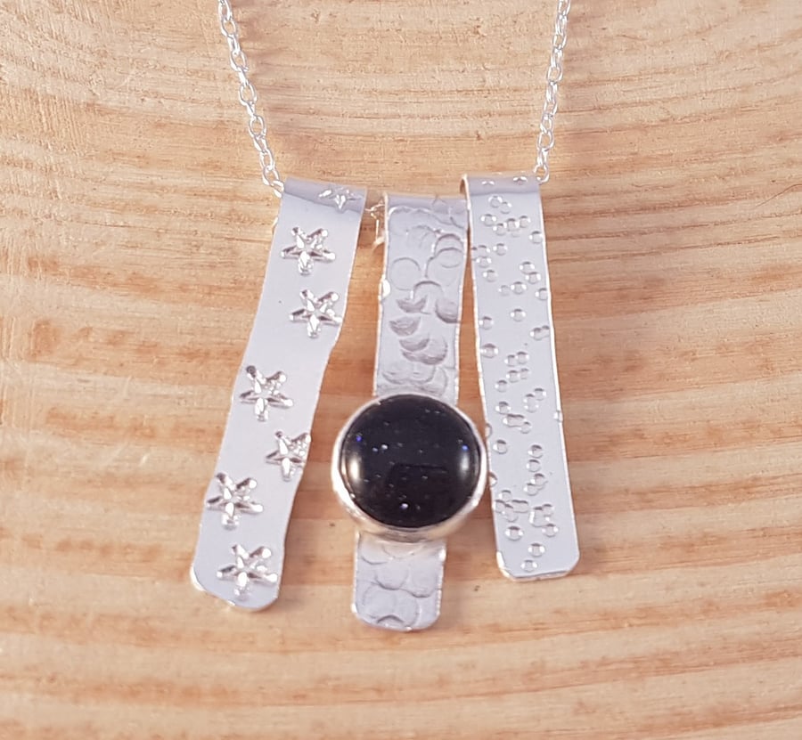 Sterling Silver Textured Strips Necklace with Blue Goldstone Cabochon