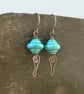 Copper earrings with teal lamp work bead and wire work - Image 5