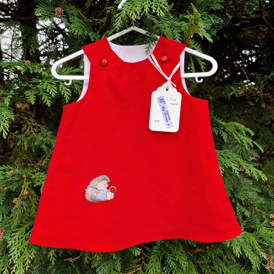 Age: 3-6m. Red Ladybird Needlecord dress. 