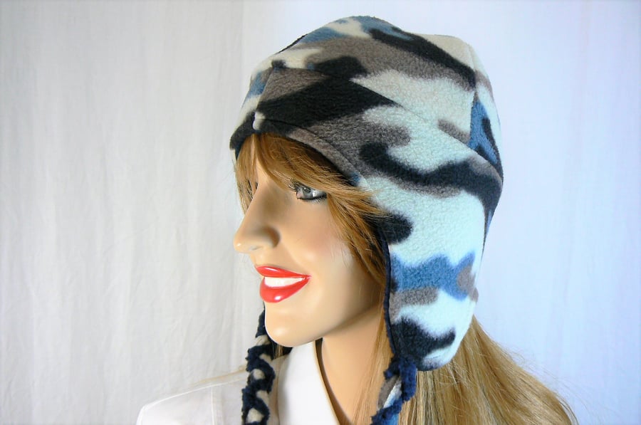 Reversible fleece hat with earflaps and ties ( blue tan cream camo and navy)