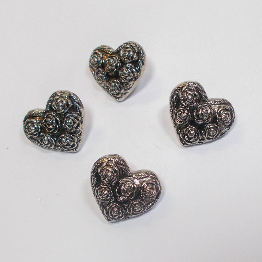 Gunmetal heart and flowers shank buttons. 22mm approximately  Pack of 4.