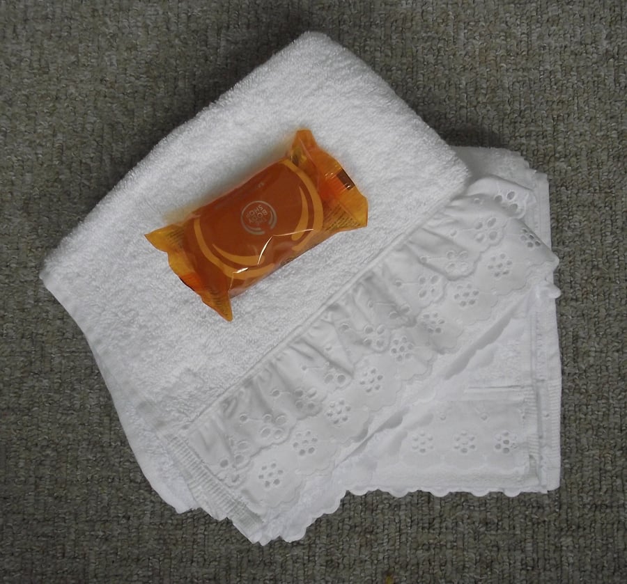 Pair of hand towels - white 100% combed cotton with broderie anglaise trim.