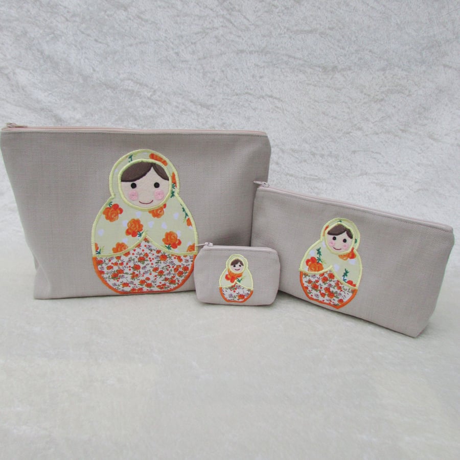 Russian doll stacking bags and purse gift set in cream, lemon and orange