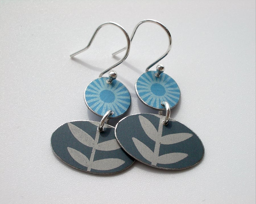 Folk art flower earrings in blue and grey