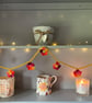 Crochet Garland of Small Bright Multicolour Flowers - Image 3