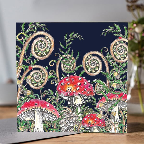 Toadstool greeting card with dark blue background 