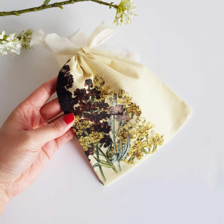 Handmade drawstring pouch with wallflower and sea stock print in Organic Cotton.